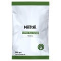 White bag of Nestlé Skimmed Milk Powder, 500g, labeled for professional use, with green accents and purity seal.