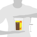 A hand holding a 750g container of Maggi Classic gelee, with dimensions of 14.8 cm height, featuring a yellow and brown label