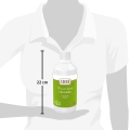 A 22 cm tall bottle of Chef liquid vegetable concentrate, featuring a white and green label, held against a figure outline.