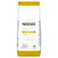 A 1 kg bag of NESCAFÉ Superiore coffee, featuring whole roasted beans, with notes of nuts and a medium body.