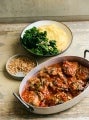 Echine de porc braisée à la sauce tomate et à la sauge. Chou Kale brûlé et polenta